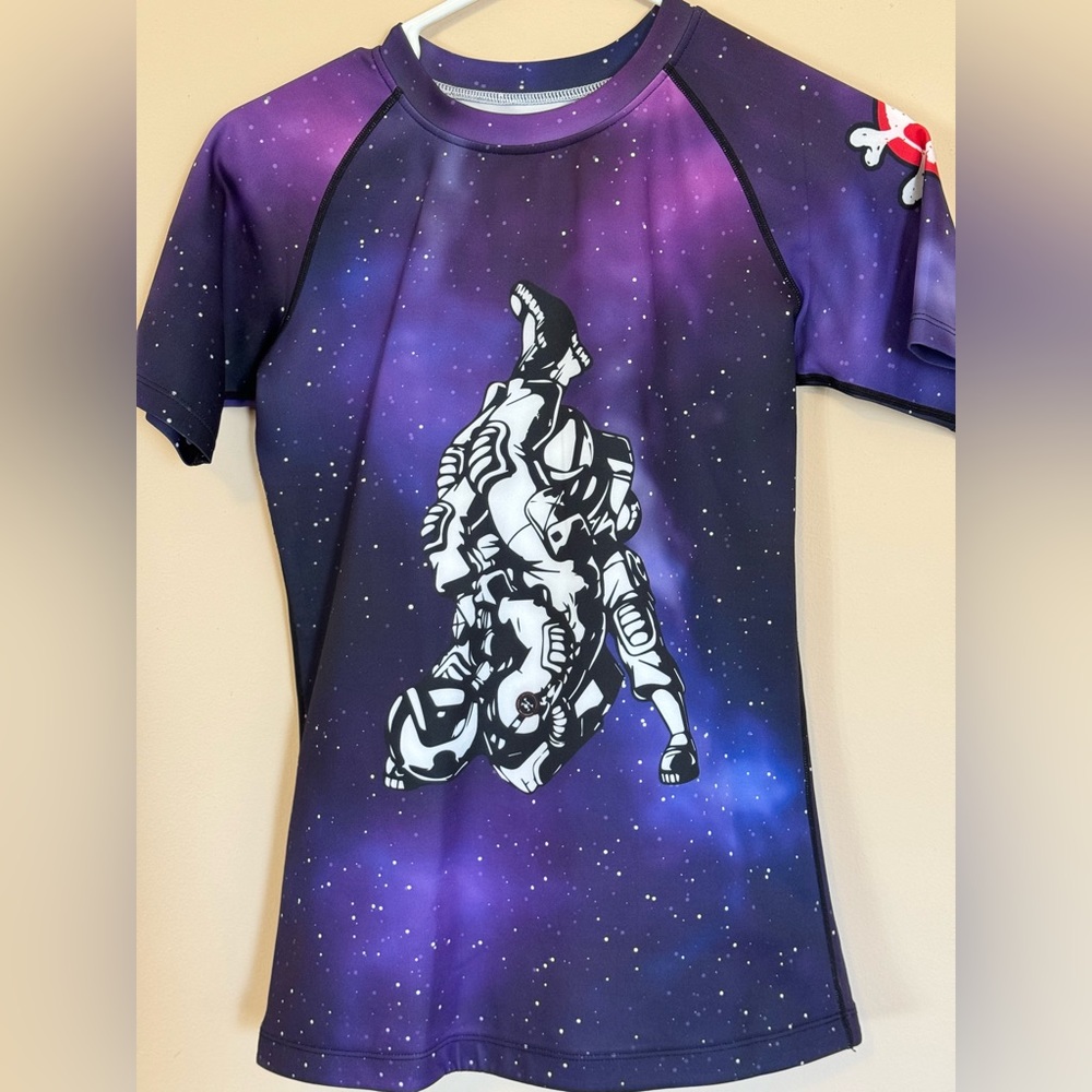 Xmartial women’s rashguard - Galaxy leg lock. Size medium. Excellent condition!